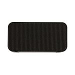 A rectangular black wireless charging speaker with a textured mesh grille on the front and a smooth finish.