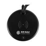 A circular black wireless charging sound lamp with a visible logo. The design is sleek and modern.