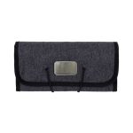 A grey folio accessory roll with a clasp closure, featuring a metallic logo and black trim.
