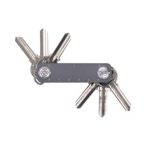 A metallic key organiser with multiple key slots and a measuring ruler, featuring a sleek design.