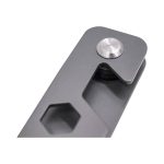 A grey metal keyring tool featuring a hexagon shape and a circular fastener. Includes a branded logo.