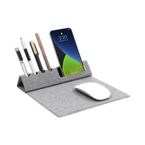 A grey foldable mouse pad with slots for pens and a phone, featuring a white mouse on the surface.