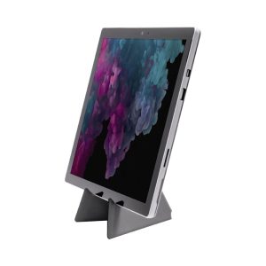 A grey phone stand displaying a tablet at an angle, featuring a sleek design with a sturdy base.