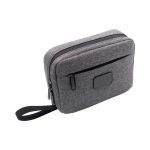 A grey toiletry bag with two zippered compartments and a side handle, featuring a logo on the front.