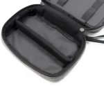 A grey toiletry bag with a zippered closure, featuring an interior pocket divider and a lined black interior.