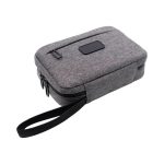 A grey toiletry bag with a zip closure and a convenient handle, featuring a sleek design.