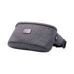 A grey anti-theft sling bag with a secure buckle and a smooth textured finish. It has a logo on the side.