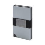 A grey vegan RFID wallet with a black elastic band, featuring a textured patch on the front for added grip.