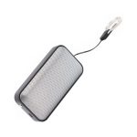 A compact black wireless speaker with a mesh front and a loop for attachment. It features a logo on the side.