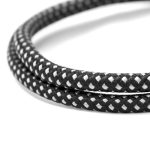 A braided black and white charging cable with a flexible design. It features a textured surface and a logo.