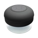 A waterproof black Bluetooth speaker with a circular design and control buttons on top. It features a clear base.