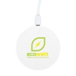A round white wireless charger with a logo and a charging cable attached.