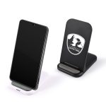 A wireless charger in black and white, with a sleek design and a logo on the black model.