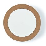 A wireless charger with a round cork exterior and a smooth white charging surface.