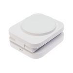 A compact white wireless charger featuring a circular charging pad and a foldable design for portability.