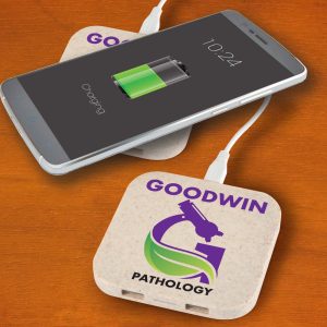 A wireless charger hub in a light-colored design, with a smartphone displaying a charging battery symbol.