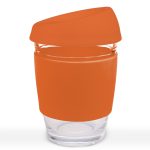 A reusable coffee cup featuring a glass body and a silicone lid in vibrant orange.