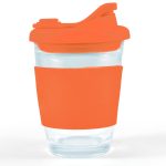 A reusable coffee cup with a clear body and an orange silicone sleeve. It features a snap lid for easy access.