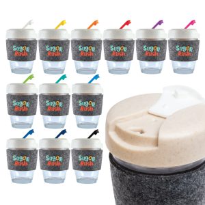 A collection of reusable coffee cups with various colored straws and gray RPET bands, featuring branding on each cup.