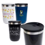 A collection of reusable coffee cups in white, navy, and black, featuring various colorful designs and a stainless steel lid.