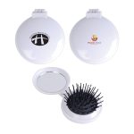 A white compact mirror and brush set featuring a textured brush head and a reflective surface, with logos on the exterior.