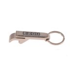 A drink bottle opener and keytag in silver metal, featuring a logo and a keyring attachment.