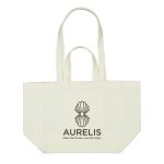 A cream canvas bag with two long handles and a large logo on the front.