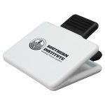 A white magnetic clip with a black clip and the logo of Southern Institute, featuring the text "Guiding Future Leaders."