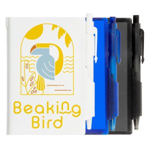 A white pocket notebook with a colorful design and three pens in black, blue, and translucent colors.