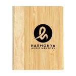 A wooden bamboo cover notebook featuring a circular logo with stylized lettering in black.