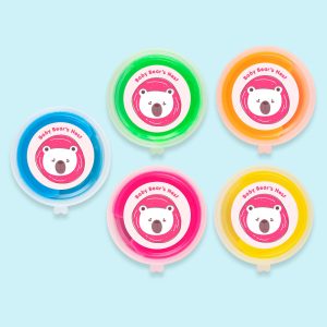 Five containers of colorful putty in blue, green, orange, pink, and yellow, each with a logo on the lid.