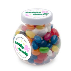 A glass jar filled with assorted colour mini jelly beans, featuring a label and a snug-fitting lid.