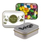 A silver rectangular tin containing assorted mini jelly beans in vibrant colors, with a branding logo on one side.