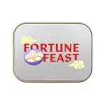A silver rectangular tin labeled "FORTUNE FEAST," featuring a bowl of dumplings and decorative elements.