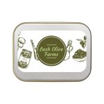 A silver rectangular tin labeled "Lush Olive Farms" featuring illustrations of various bottles and olives.