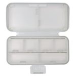 A white compact pill organizer with multiple compartments, featuring a hinged lid and a clean, minimalist design.