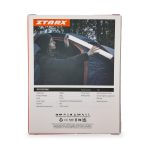 A foldable camp light in a white casing, displayed by a person inside a tent, with a logo visible on the product.