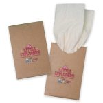 A pack of bamboo tissues in a brown cardboard holder, with white tissues peeking out. The packaging features colorful graphics.