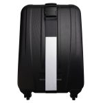 A black suitcase featuring a luggage strap across its surface for secure fastening.