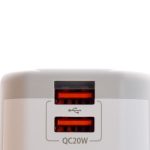 A travel adaptor with two USB ports, featuring Quick Charge technology.