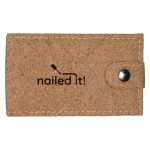 A cork manicure set in a beige case with a button closure and a logo printed on the front.