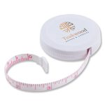 A white circular tape measure with a pink measuring tape extending from it, featuring a logo on the top.