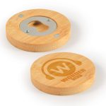 A drink bottle opener coaster made of natural bamboo with a silver opener and a branded logo on one side.