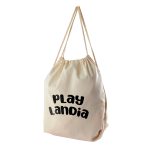 A beige drawstring backpack featuring the text "Play Landia" and two tan cords for closure.