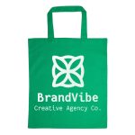 A green cotton tote bag with a large white logo featuring a flower design and the text "BrandVibe Creative Agency Co."