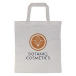 A beige tote bag with short handles and a logo in the center.