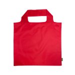 A red reusable grocery bag with a rounded handle and a small logo. The bag is made from recycled PET material.