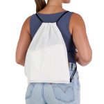 A white drawstring backpack is worn on the back of a person, featuring black straps and a simple design.
