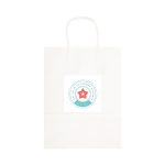 A large white paper bag with a handle and a circular logo featuring a star design.