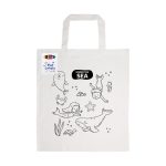A white cotton tote bag featuring ocean-themed illustrations ready for colouring, with a logo attached.